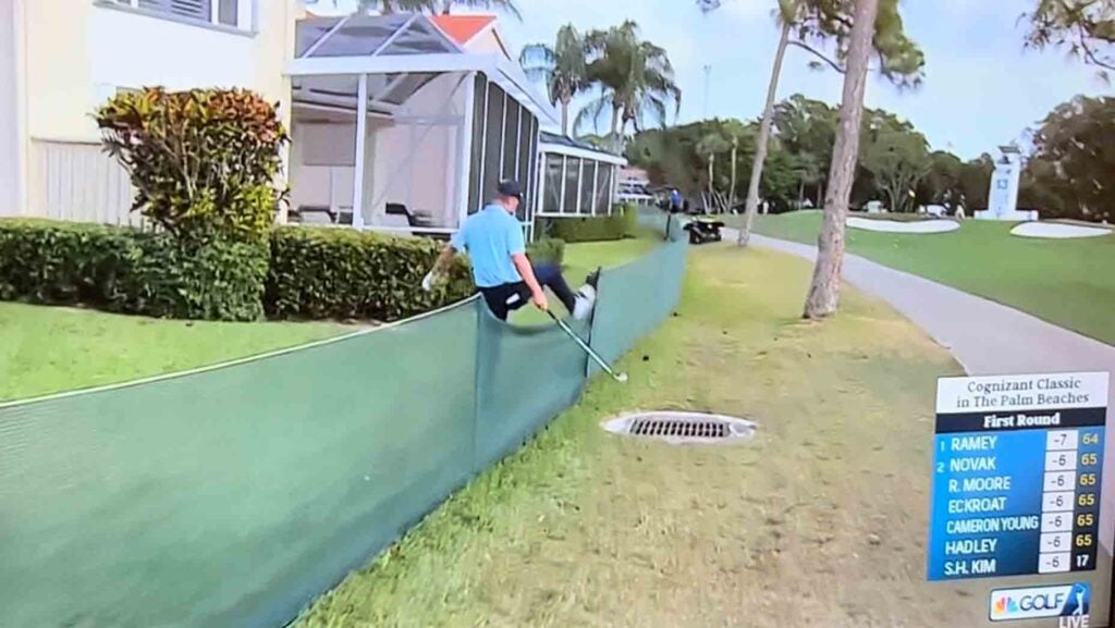 Denied relief, major winner uses another rule — and swings through fence